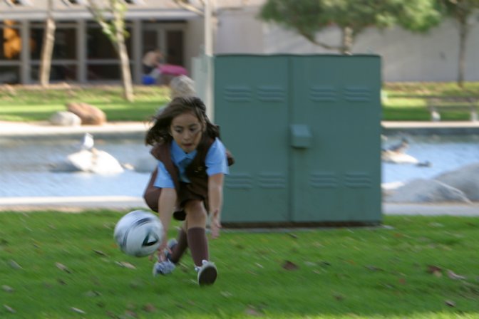 Crystal plays soccer with Sara and Quinn