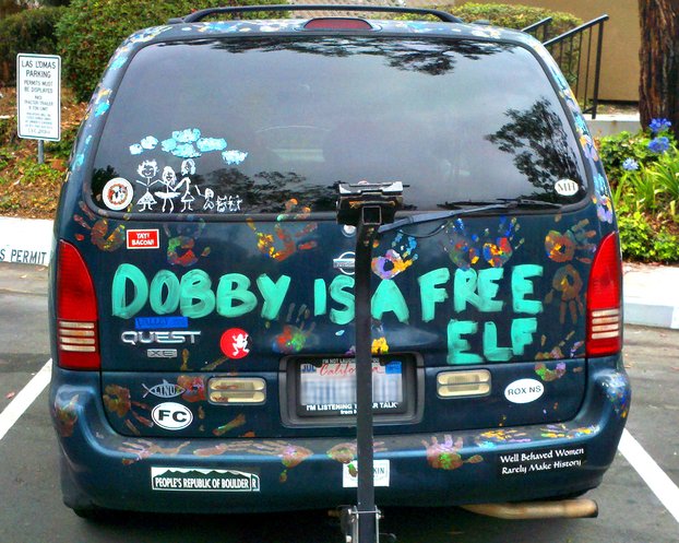 Nissan Quest minivan painted to say 'Dobby is a free elf'