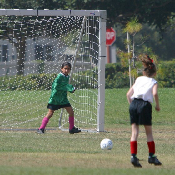 Maryam prepares to stop a goal attempt