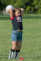 Kelsey practices throwing