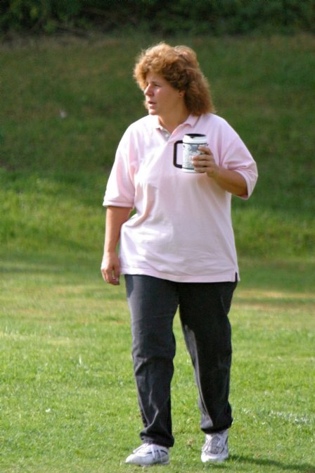 Coach Kathy arrives with her coffee