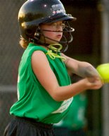Megan puts bat on ball