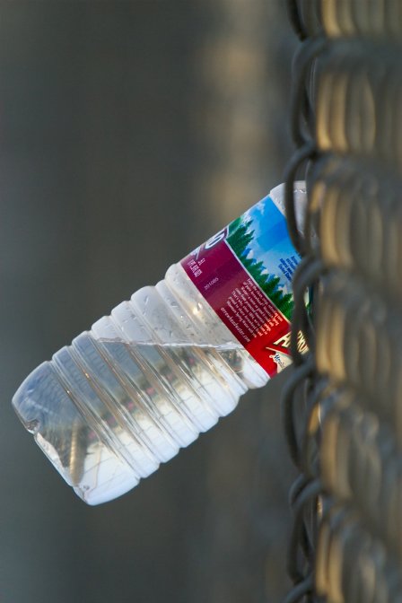 Water bottle in the backstop