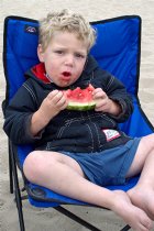 Timothy eats watermelon