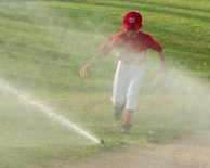 Sprinklers cause end to Little League game