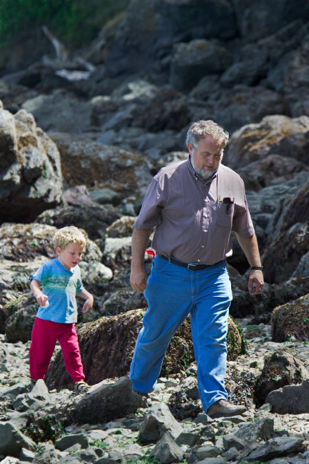 Richard and Timothy exploring the beach rocks