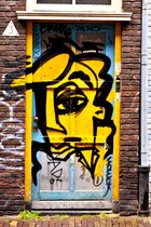 Yellow face, graffiti in Spui, Amsterdam