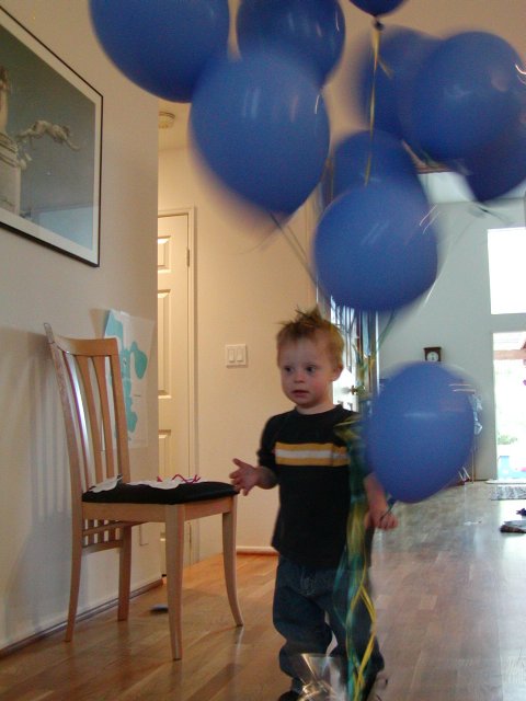 Drake playing with balloons