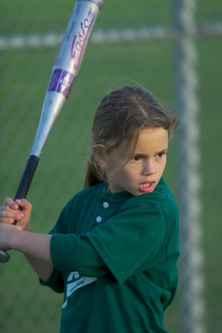 Danielle practicing batting