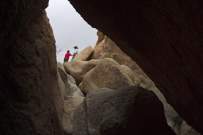 Scott and Mark through a cave on a climb
