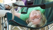 Sara relaxes in a camp chair