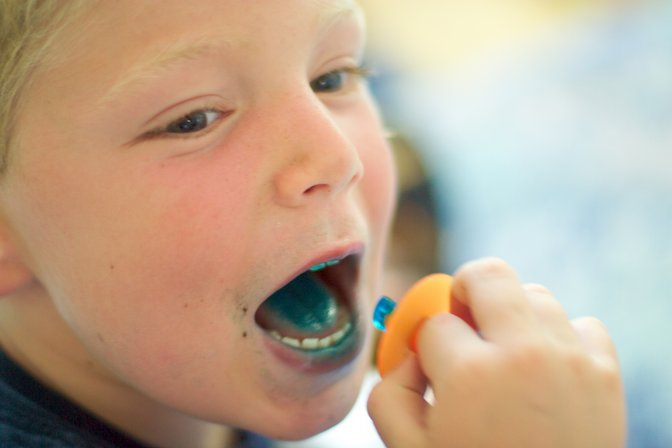 Timothy eats blue candy
