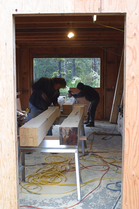 Shaping porch pillars in the workshop