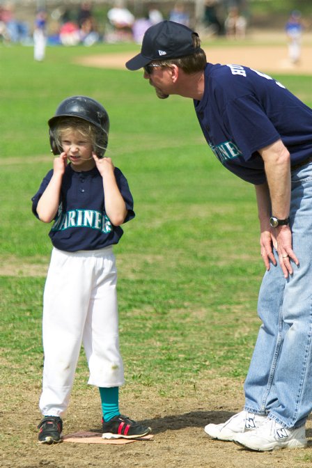 Kiley gets some advice from the first base coach