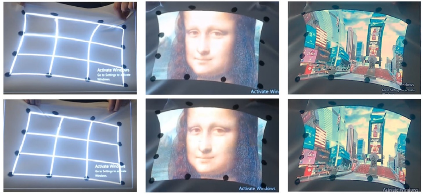 Dynamic projection mapping on deformable stretchable materials using boundary tracking