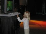 A young visitor examines the island